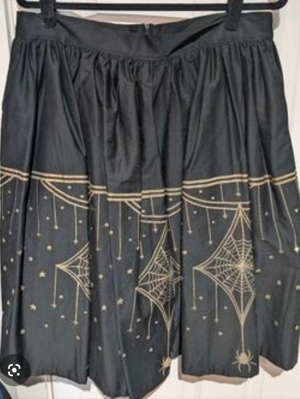 Pinup Couture Laura Byrnes Black Skirt with Gold Spiderweb Print